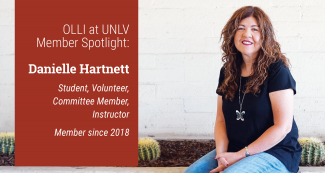 Danielle Hartnett outside in front of white brick wall. Member since 2018